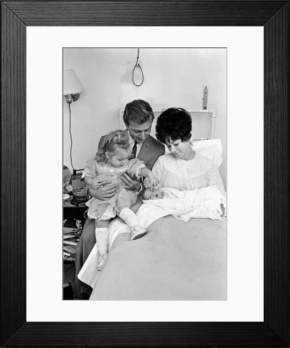 Framed Print : A magic moment is captured by the camera when two year old Tracy saw for the first time Framed Print : A magic moment is captured by the camera when two year old Tracy saw for the first time