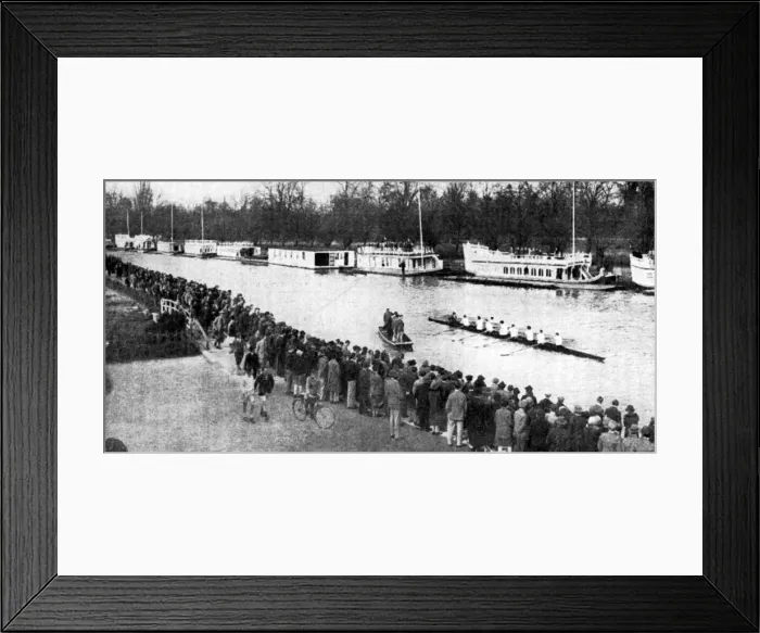 Framed Print : An Oxford womens eight at the finishing post after taking part in a rowing match Framed Print : An Oxford womens eight at the finishing post after taking part in a rowing match
