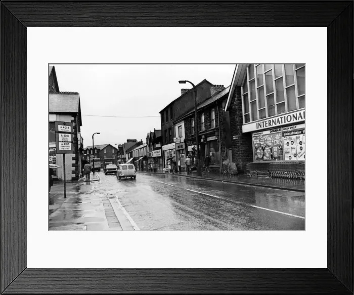 Framed Print : The main shopping street in Treorchy, Wales. 8th November 1979 Framed Print : The main shopping street in Treorchy, Wales. 8th November 1979