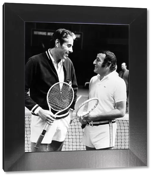 Singer Tony Bennett (right) chatting to his opponent, Pancho Gonzales at the Albert Hall