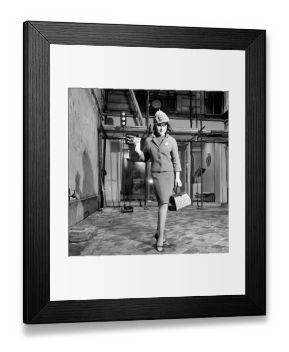 Framed Print : Clothing: Fashion: Paris: Woman modelling the latest 1963 French clothes designs in Paris