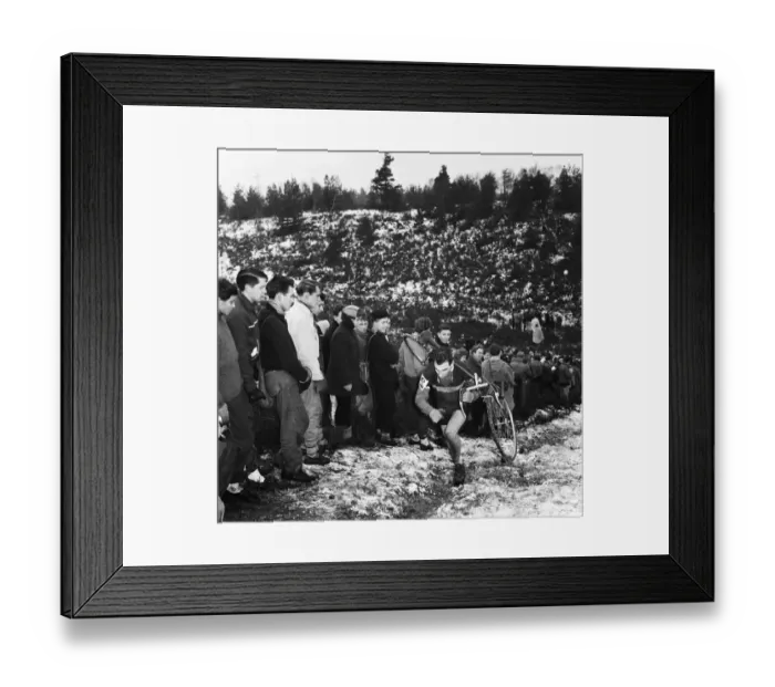 Framed Print : Bagshot Cyclist carries his bike during the Competition on Bagshot Heath Surrey