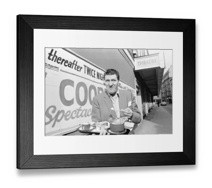Framed Print : Tommy Cooper seen here having breakfast outside The New Theatre, Oxford Framed Print : Tommy Cooper seen here having breakfast outside The New Theatre, Oxford