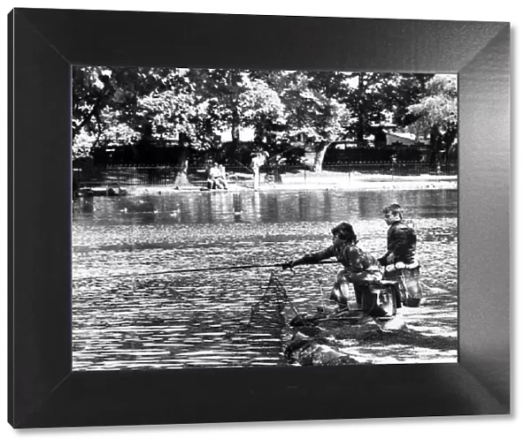 Children fishing in the lake at Albert Park, Middlesbrough, North Yorkshire. Circa 1979