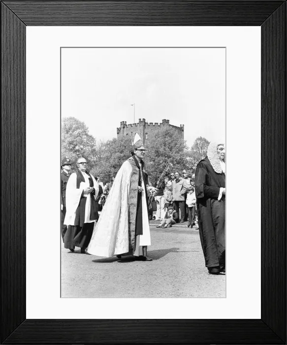 Framed Print : The Rt Revd Dr John Habgood the Bishop of Durham strikes the doors of the Cathedral with Framed Print : The Rt Revd Dr John Habgood the Bishop of Durham strikes the doors of the Cathedral with