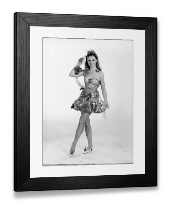 Framed Print : Vyvyan Dunbar seen here dressed in her Christmas Party outfit. 1962 E569-002