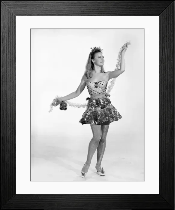 Framed Print : Vyvyan Dunbar seen here dressed in her Christmas Party outfit. 1962 E569-005
