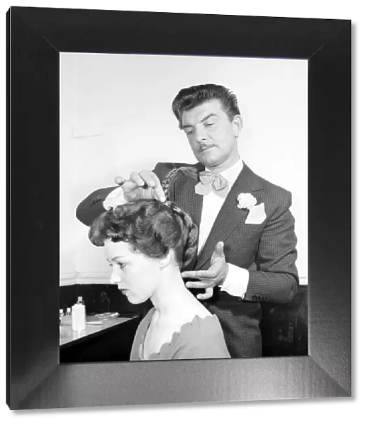 Fashion: Hair styles by Raymond. April 1956 B475-003