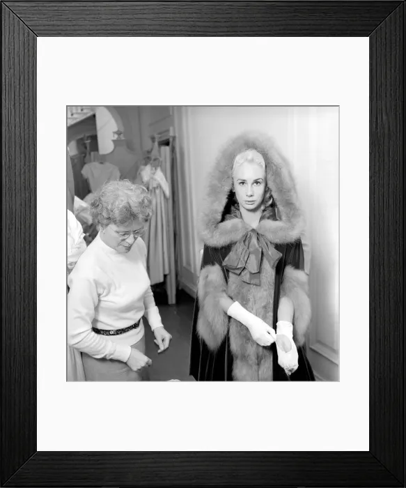 Framed Print : Members of the Wardrobe and make-up departments at Pinewood Studios help the actresses Framed Print : Members of the Wardrobe and make-up departments at Pinewood Studios help the actresses