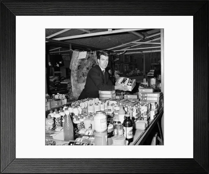 Framed Print : Blackburn Rovers footballer Bryan Douglas serving on his stall at the Morecambe market Framed Print : Blackburn Rovers footballer Bryan Douglas serving on his stall at the Morecambe market