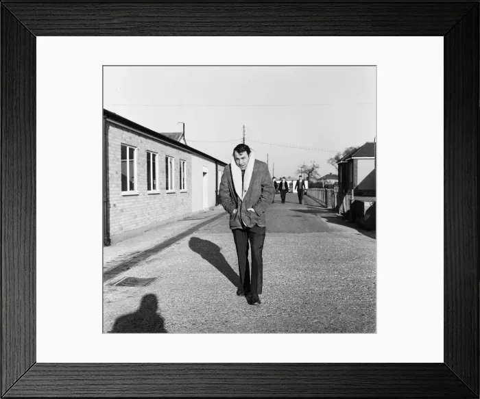 Framed Print : Tottenham and England footballer Jimmy Greaves wraps up against the cold on his way for a Framed Print : Tottenham and England footballer Jimmy Greaves wraps up against the cold on his way for a