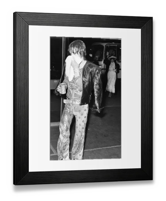 Framed Print : Mick Jagger of the Rolling Stones arriving at the Odeon New Street
