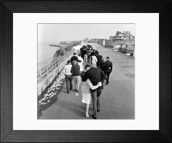 Framed Print : An after lunch walk on the promenade in the March sunshine Framed Print : An after lunch walk on the promenade in the March sunshine