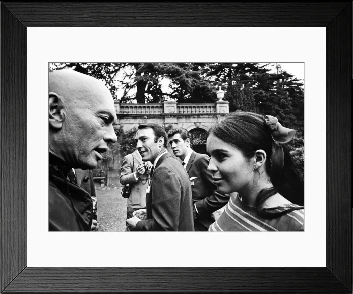 Framed Print : Actress Vivienne Ventura talks to Yul Brynner (left), flanking footballers Jimmy Framed Print : Actress Vivienne Ventura talks to Yul Brynner (left), flanking footballers Jimmy