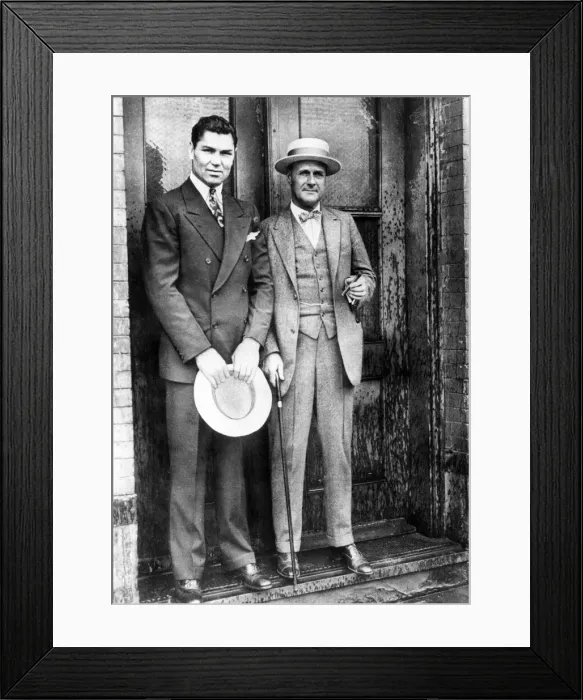 Framed Print : Jack Dempsey (left) with boxing promoter Tex Rickard. 1927 Framed Print : Jack Dempsey (left) with boxing promoter Tex Rickard. 1927