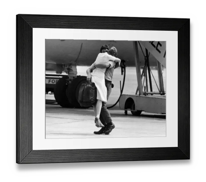 Framed Print : A welcome home for one of the survivors of the Atlantic Conveyor