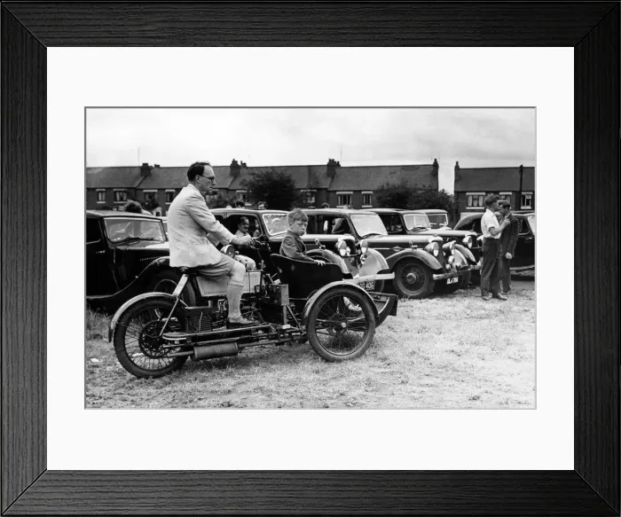 Framed Print : Eight-year-old Andrew Scott, son of Coventrys municipal motoring museum curator Framed Print : Eight-year-old Andrew Scott, son of Coventrys municipal motoring museum curator