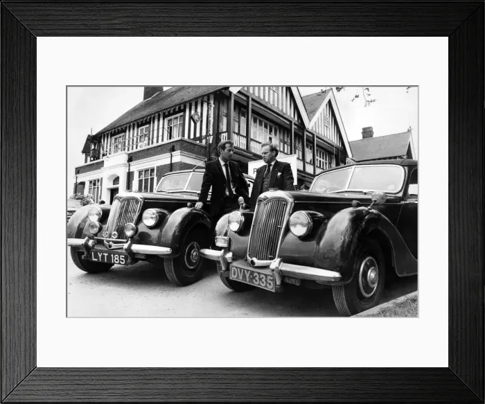 Framed Print : Two 1&1 / 2 litre postwar Rileys and their owners. Mr John Milburn (right) Framed Print : Two 1&1 / 2 litre postwar Rileys and their owners. Mr John Milburn (right)
