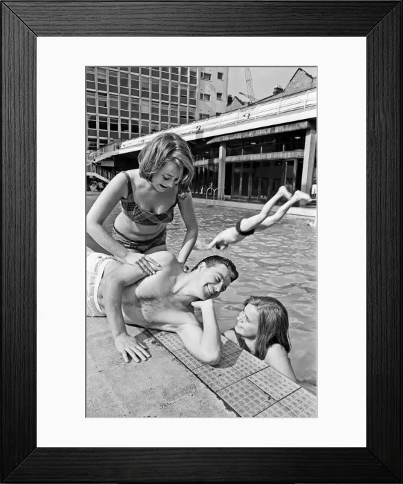Framed Print : Footballer Johnny Byrne relaxing at Oasis swimming baths. 21st August 1964 Framed Print : Footballer Johnny Byrne relaxing at Oasis swimming baths. 21st August 1964