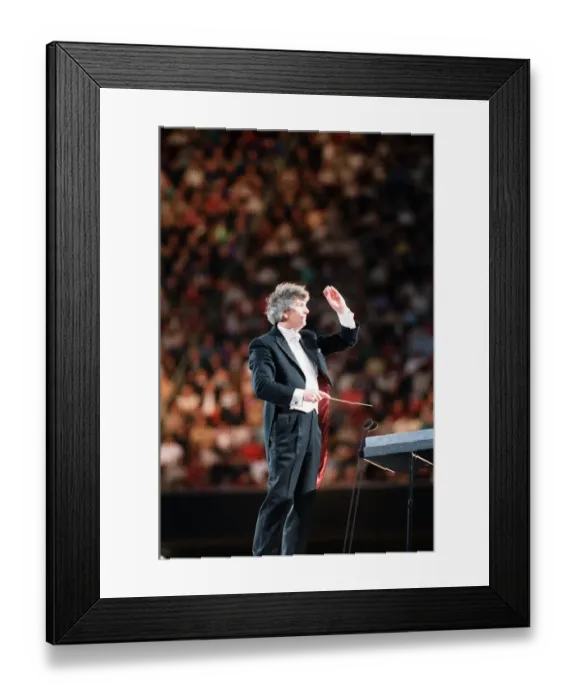 Framed Print : Conductor Owain Arwel Hughes at the Cor World Choir concert at Cardiff Arms Park