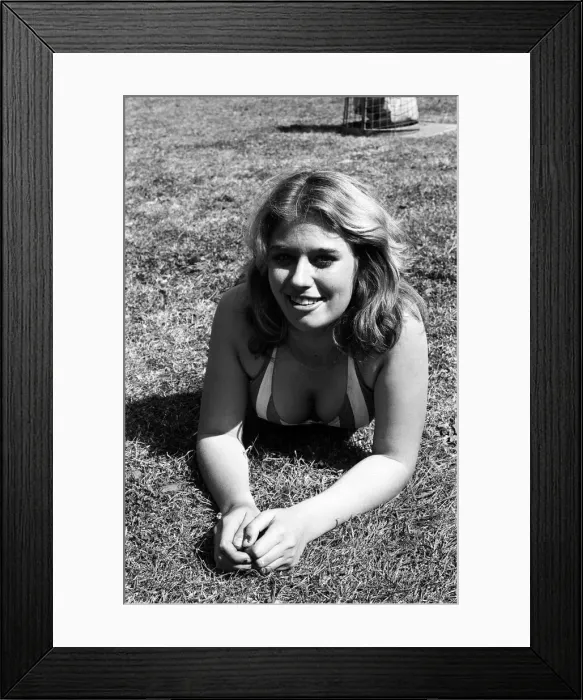 Framed Print : A woman enjoys the heatwave in Broad Lane, Berkshire. June 1976 Framed Print : A woman enjoys the heatwave in Broad Lane, Berkshire. June 1976