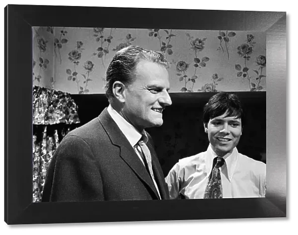 Billy Graham visits Goldhawk Studios, where the film Two a Penny was being made