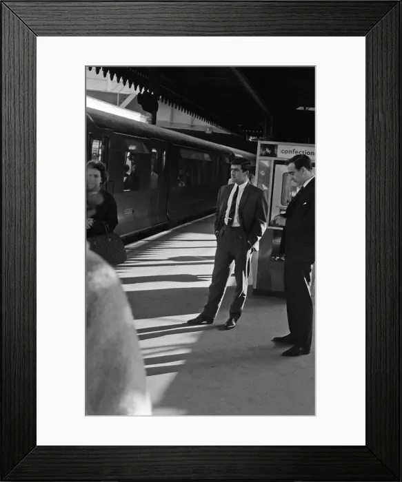 Framed Print : Footballer Terry Venables on his way to work using public transport in London