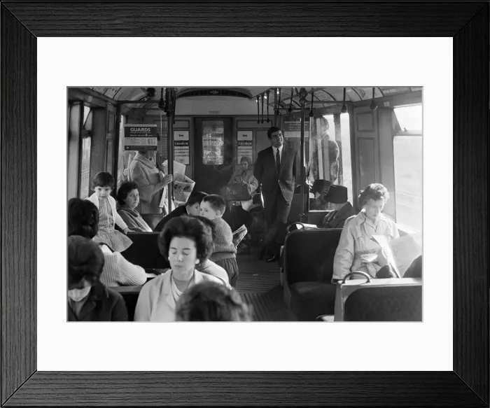 Framed Print : Footballer Terry Venables on his way to work using public transport in London