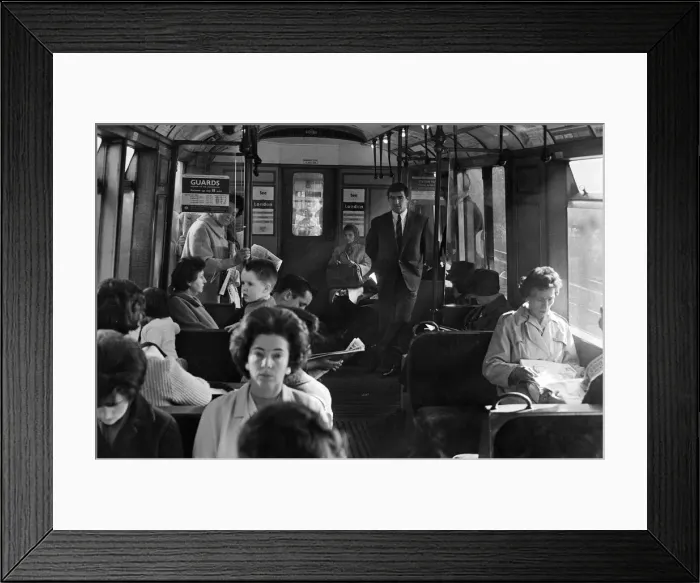 Framed Print : Footballer Terry Venables on his way to work using public transport in London