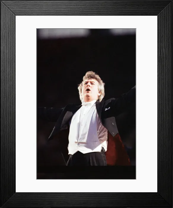 Framed Print : Conductor Owain Arwel Hughes at the Cor World Choir concert at Cardiff Arms Park