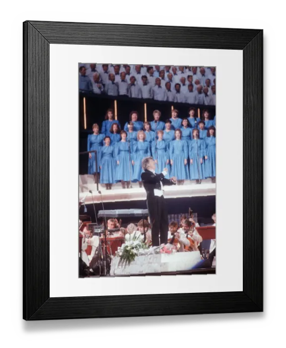 Framed Print : Conductor Owain Arwel Hughes at the Cor World Choir concert at Cardiff Arms Park