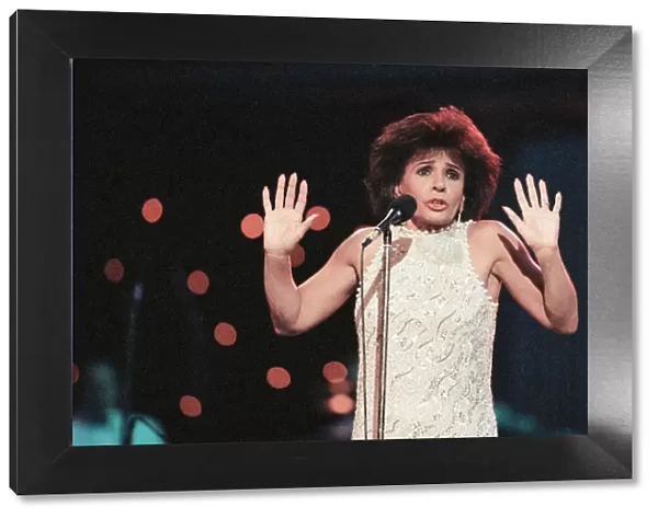 Shirley Bassey performing at the Cor World Choir concert at Cardiff Arms Park