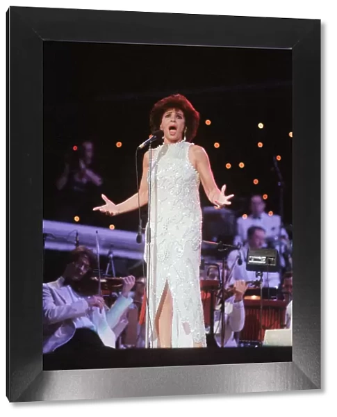 Shirley Bassey performing at the Cor World Choir concert at Cardiff Arms Park