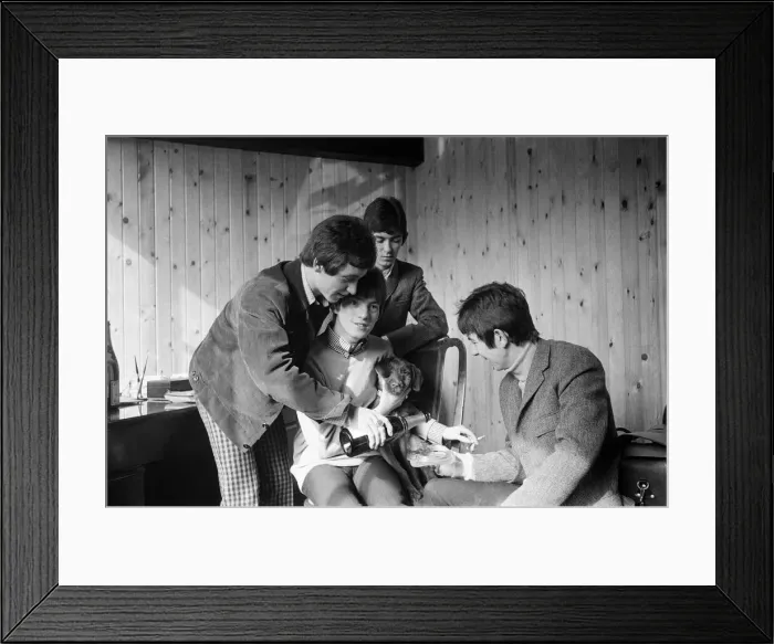 Framed Print : The Small Faces pop group in Carnaby Street as they celebrate going to the top of Framed Print : The Small Faces pop group in Carnaby Street as they celebrate going to the top of