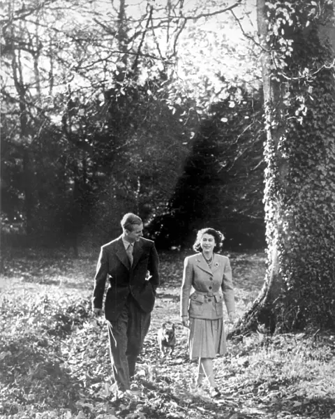 The happy couple on their honeymoon in the woods of Broadlands, Romsey