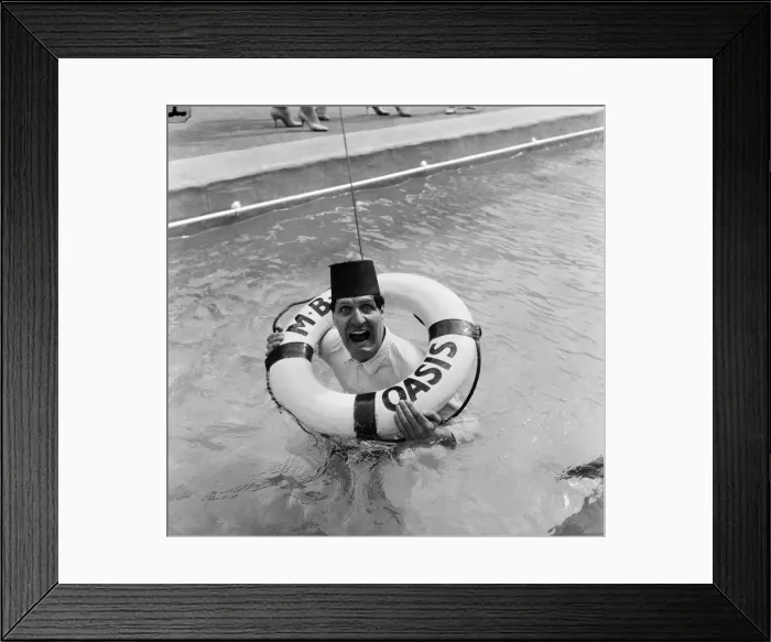 Framed Print : Tommy Cooper opening the Oasis outdoor swimming pool in Holborn for the season Framed Print : Tommy Cooper opening the Oasis outdoor swimming pool in Holborn for the season