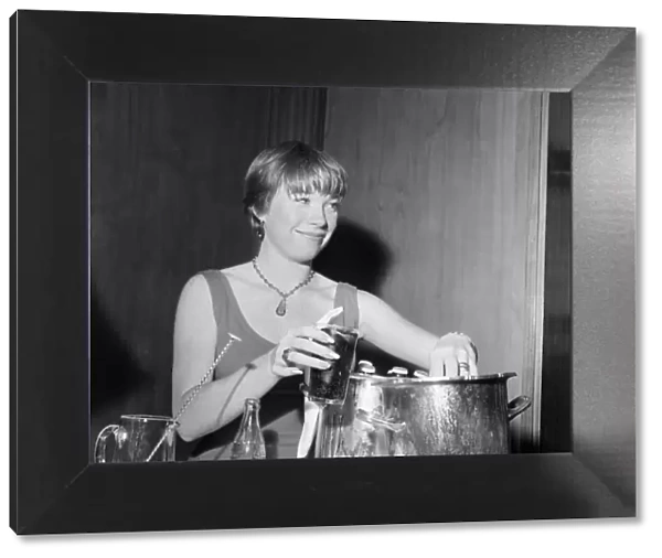 Shirley MacLaine, pictured enjoying a glass of coke in her room at Claridge