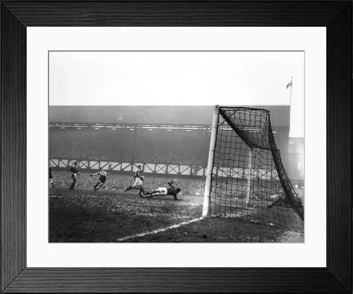 Framed Print : Jackie Milburn of Newcastle United scores a goal against Portsmouth. FA Cup Quarter-final Framed Print : Jackie Milburn of Newcastle United scores a goal against Portsmouth. FA Cup Quarter-final