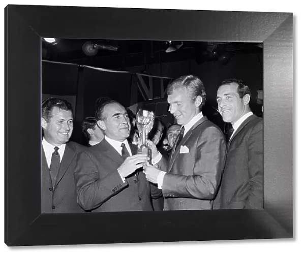 England manager Alf ramsey and captain Bobby Moore proudly hold the Jules Rimet