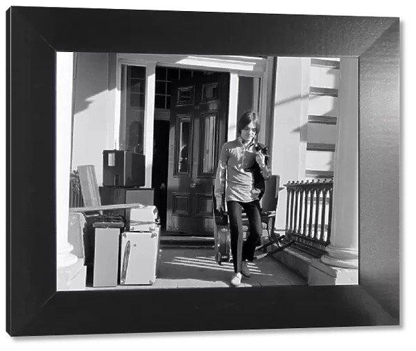Steve Marriott of the Small Faces pop group pictured moving out of his flat in Princess