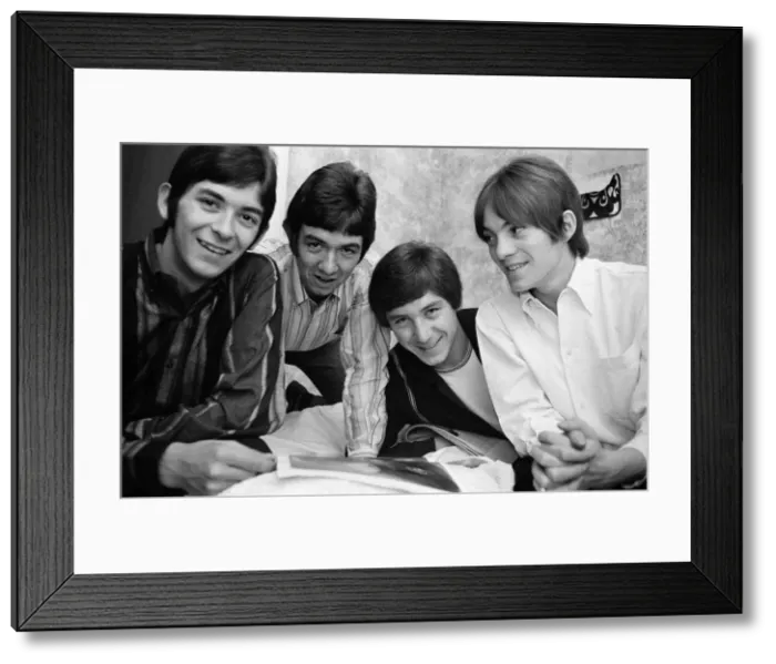 Framed Print : The Small Faces pop group pictured in a provincial hotel room as they watch their latest Framed Print : The Small Faces pop group pictured in a provincial hotel room as they watch their latest