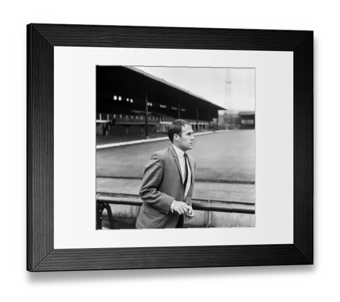 Framed Print : Huddersfield town footballer Ray Wilson looking at the ground at Leeds Road before his Framed Print : Huddersfield town footballer Ray Wilson looking at the ground at Leeds Road before his