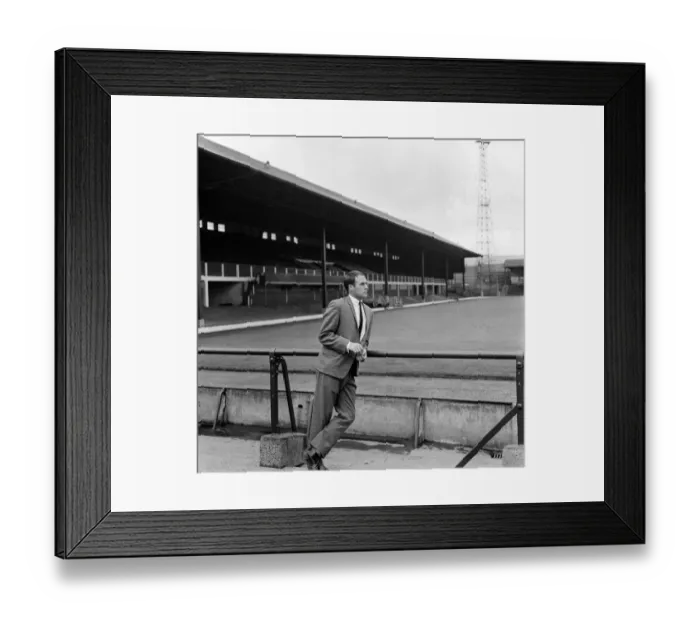 Framed Print : Huddersfield town footballer Ray Wilson looking at the ground at Leeds Road before his Framed Print : Huddersfield town footballer Ray Wilson looking at the ground at Leeds Road before his