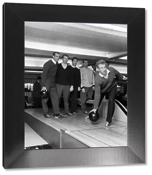 Fulham footballer Alan Mullery with teammates enjoying some recreational time bowling at