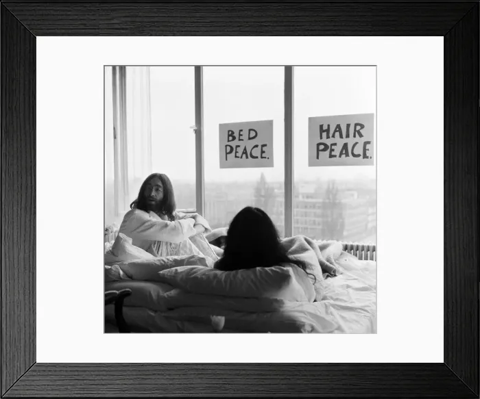 Framed Print : John Lennon and his wife Yoko Ono stage a bed in in a hotel in Amsterdam Framed Print : John Lennon and his wife Yoko Ono stage a bed in in a hotel in Amsterdam