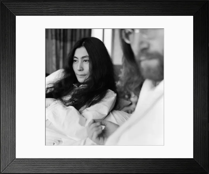 Framed Print : John Lennon and his wife Yoko Ono stage a bed in in a hotel in Amsterdam Framed Print : John Lennon and his wife Yoko Ono stage a bed in in a hotel in Amsterdam