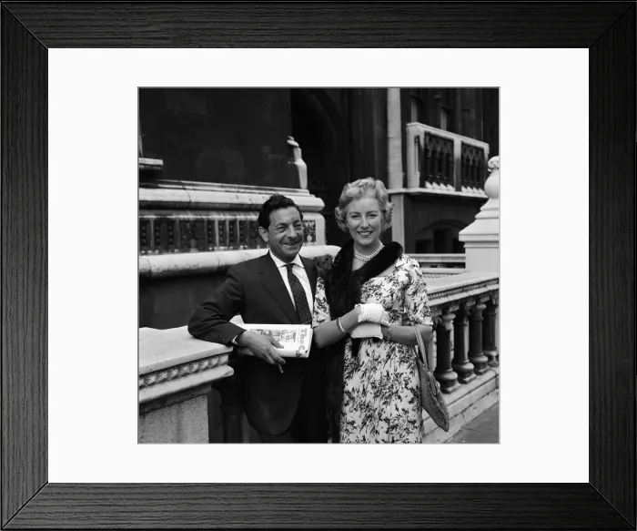 Framed Print : Vera Lynn and her husband Harry Lewis pictured after she was given judgement in a music