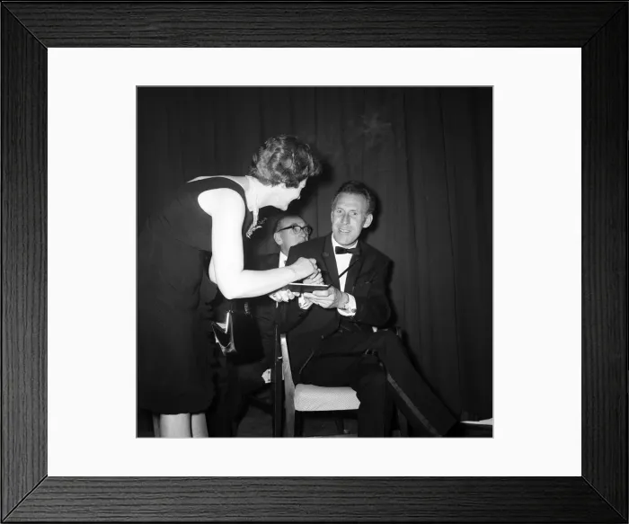 Framed Print : Bruce Forsyth signing an autograph at the Daily Mirror Television Award show Framed Print : Bruce Forsyth signing an autograph at the Daily Mirror Television Award show