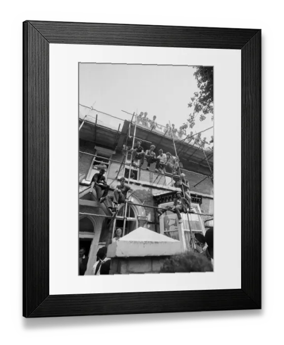 Framed Print : Admires climb scaffolding and occupy every other possible viewpoint to get a glimpse of