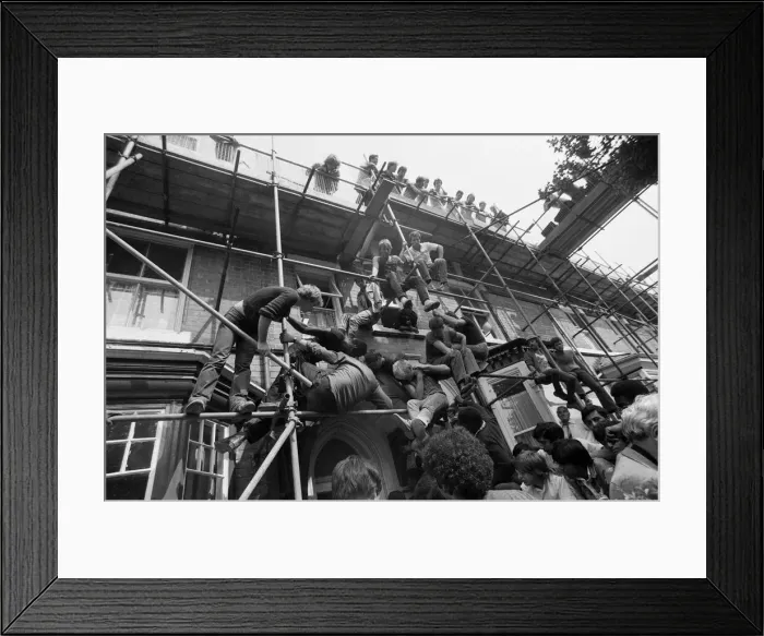Framed Print : Admires climb scaffolding and occupy every other possible viewpoint to get a glimpse of Framed Print : Admires climb scaffolding and occupy every other possible viewpoint to get a glimpse of